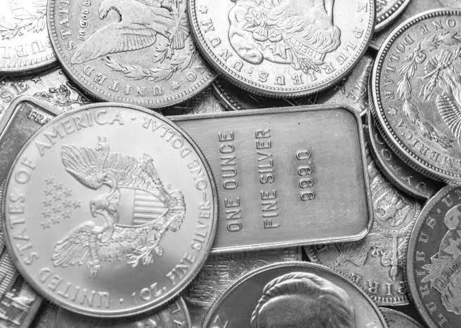 Silver coins and fine silver bar 999.0
