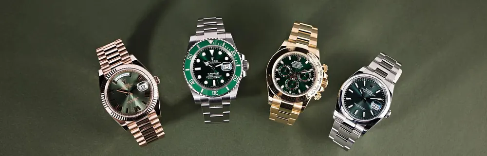 Four luxury Rolex watches displayed in a row